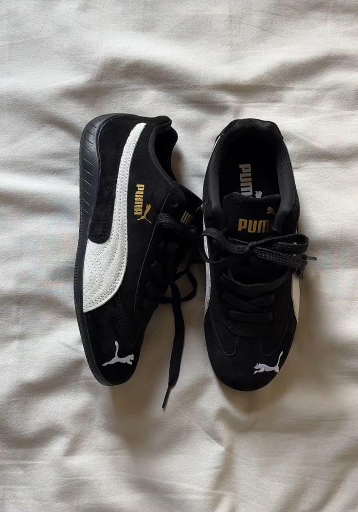 Puma Suede Black and White Sneakers