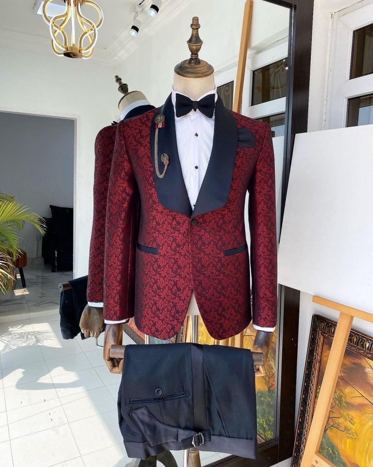 Deji and Kola A Shawl lapel jacquard patterned burgundy tuxedo suit