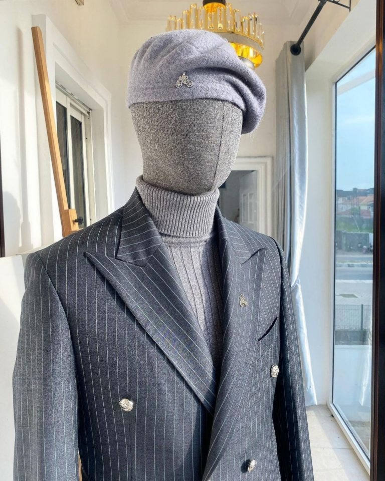 Deji and Kola A Classic Peak Lapel Grey Pin Stripe Double Breasted Suit