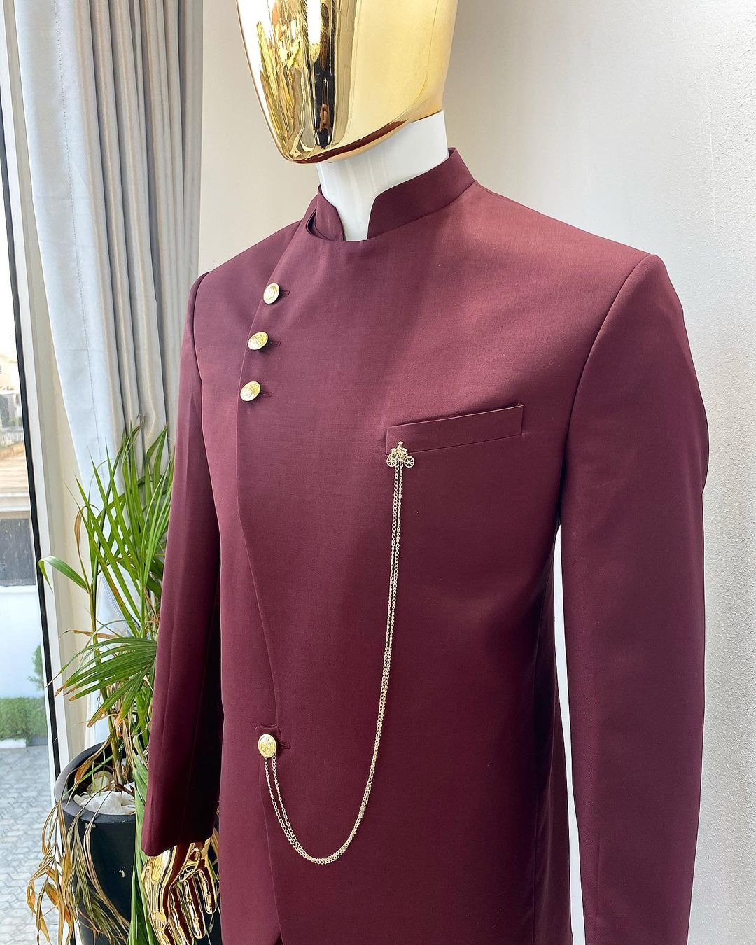 Deji and Kola A Reloaded Burgundy Separated Buttons “French” Safari Suit