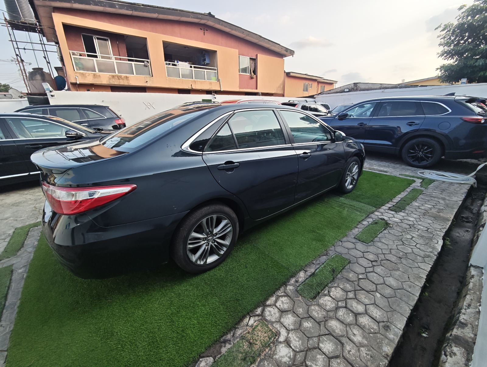 Toyota Camry, Black Sedan with Leather Seats — photo 6