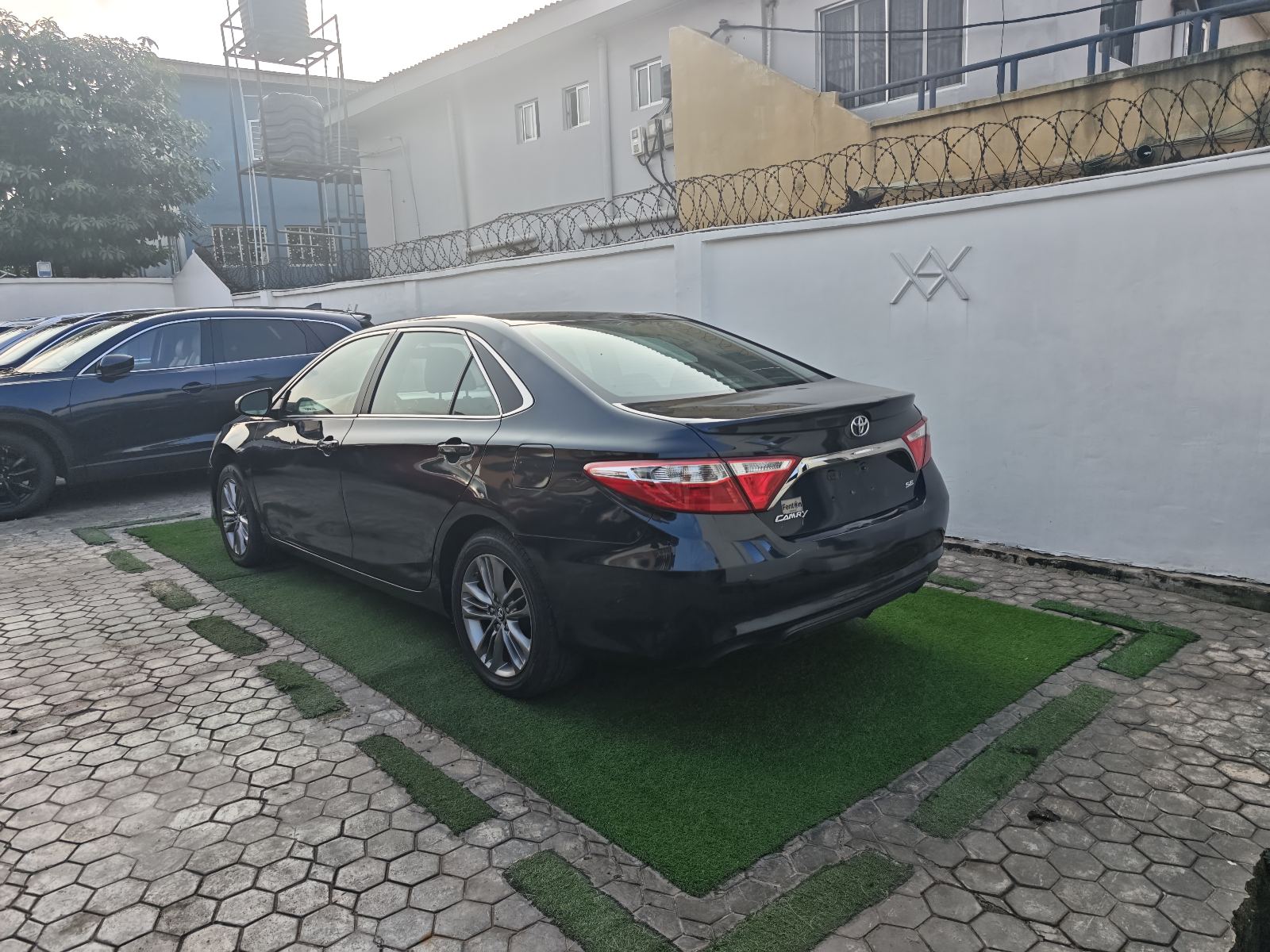 Toyota Camry, Black Sedan with Leather Seats — photo 10