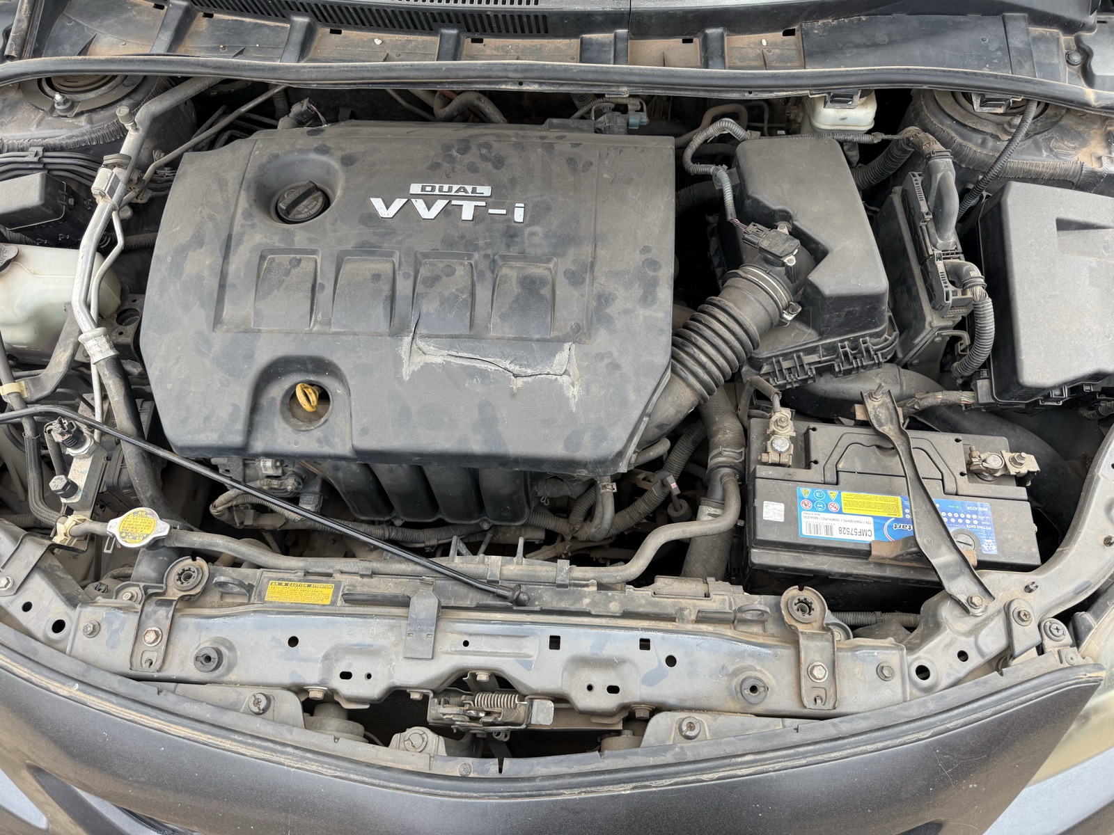 Toyota Corolla, Dark Grey Sedan with Alloy Wheels