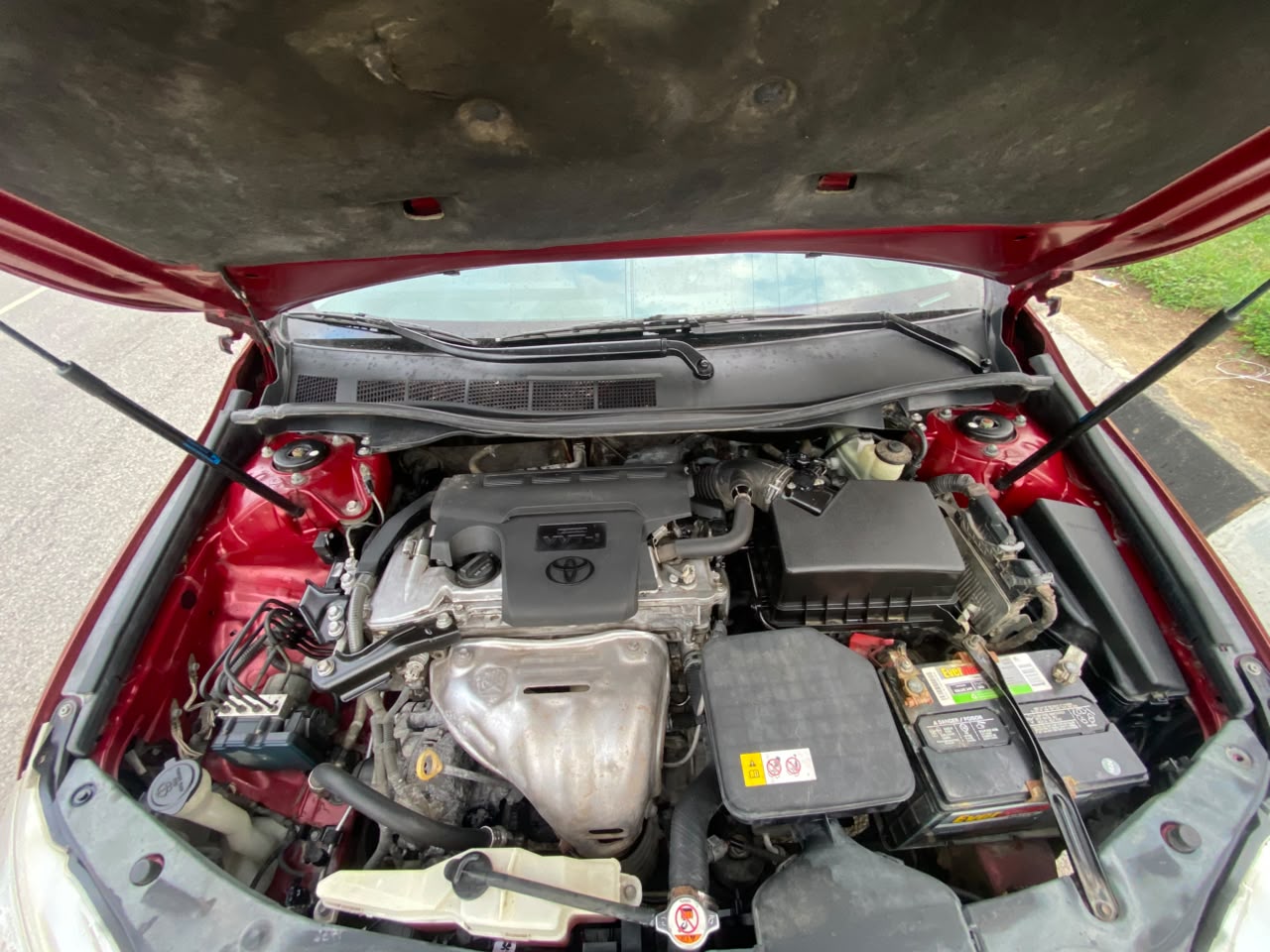 Toyota Camry Red Sedan with Black Interior XLE — photo 6