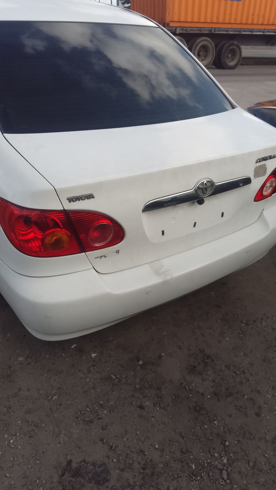 Toyota Corolla White Sedan