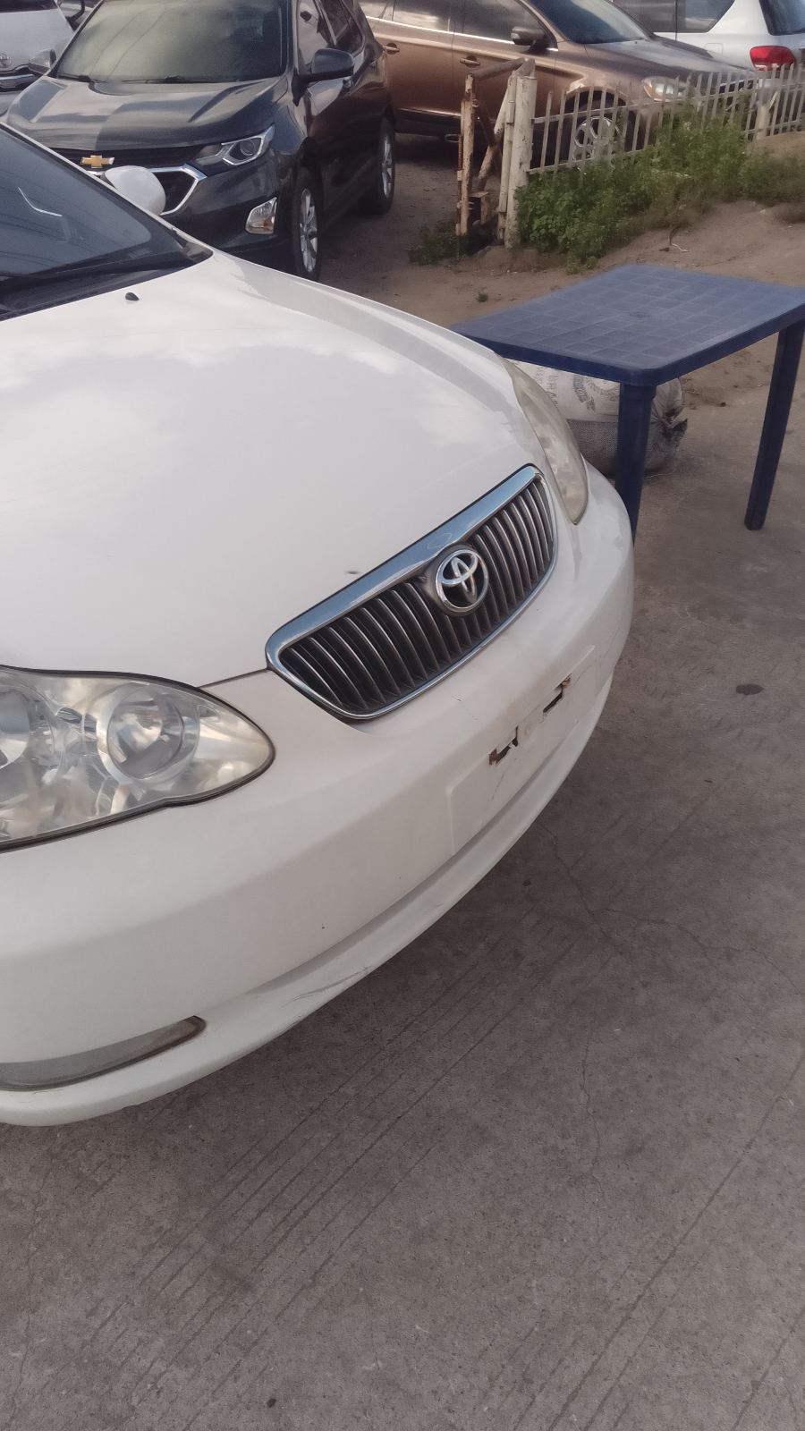 Toyota Corolla White Sedan