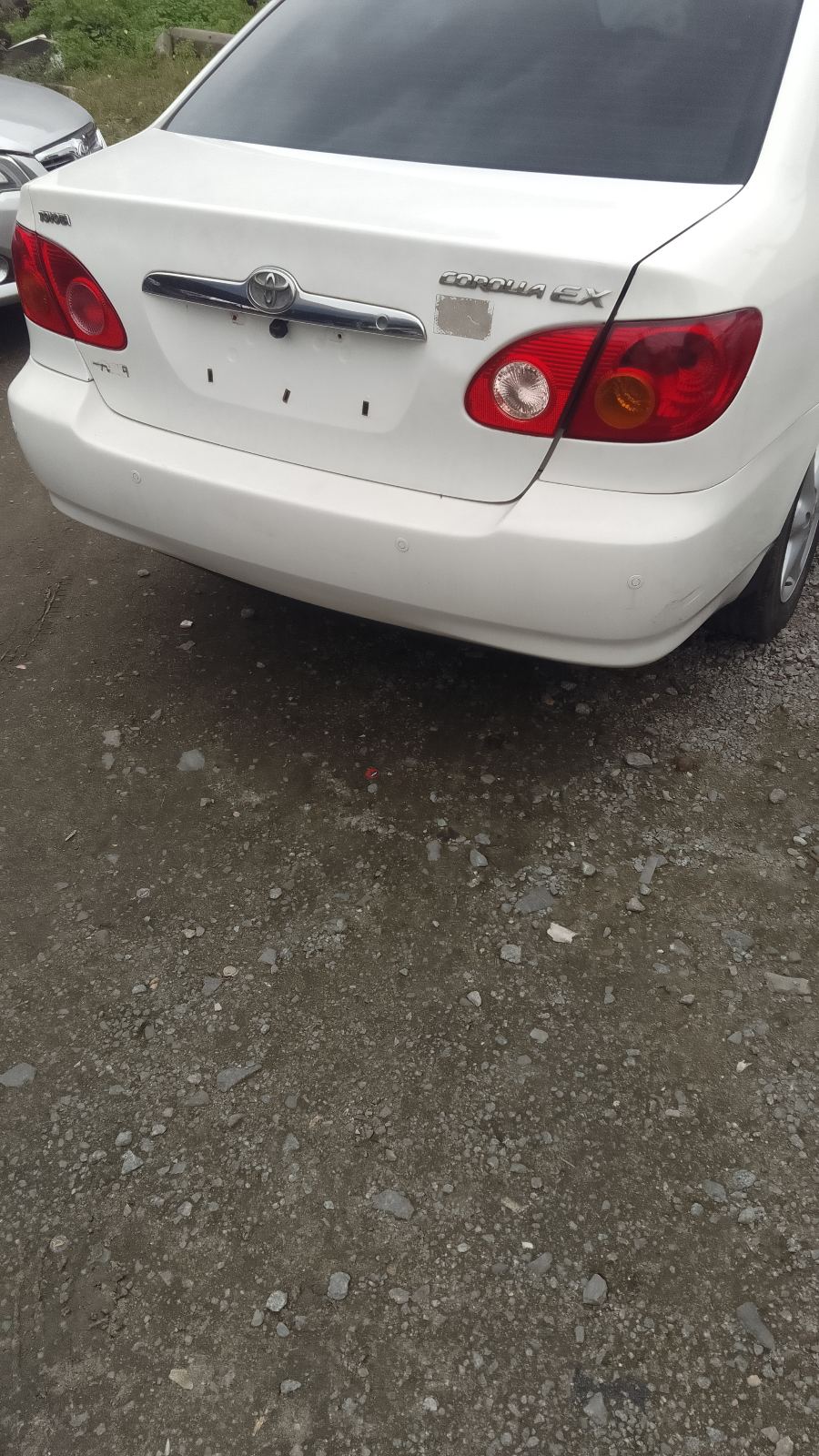 Toyota Corolla White Sedan