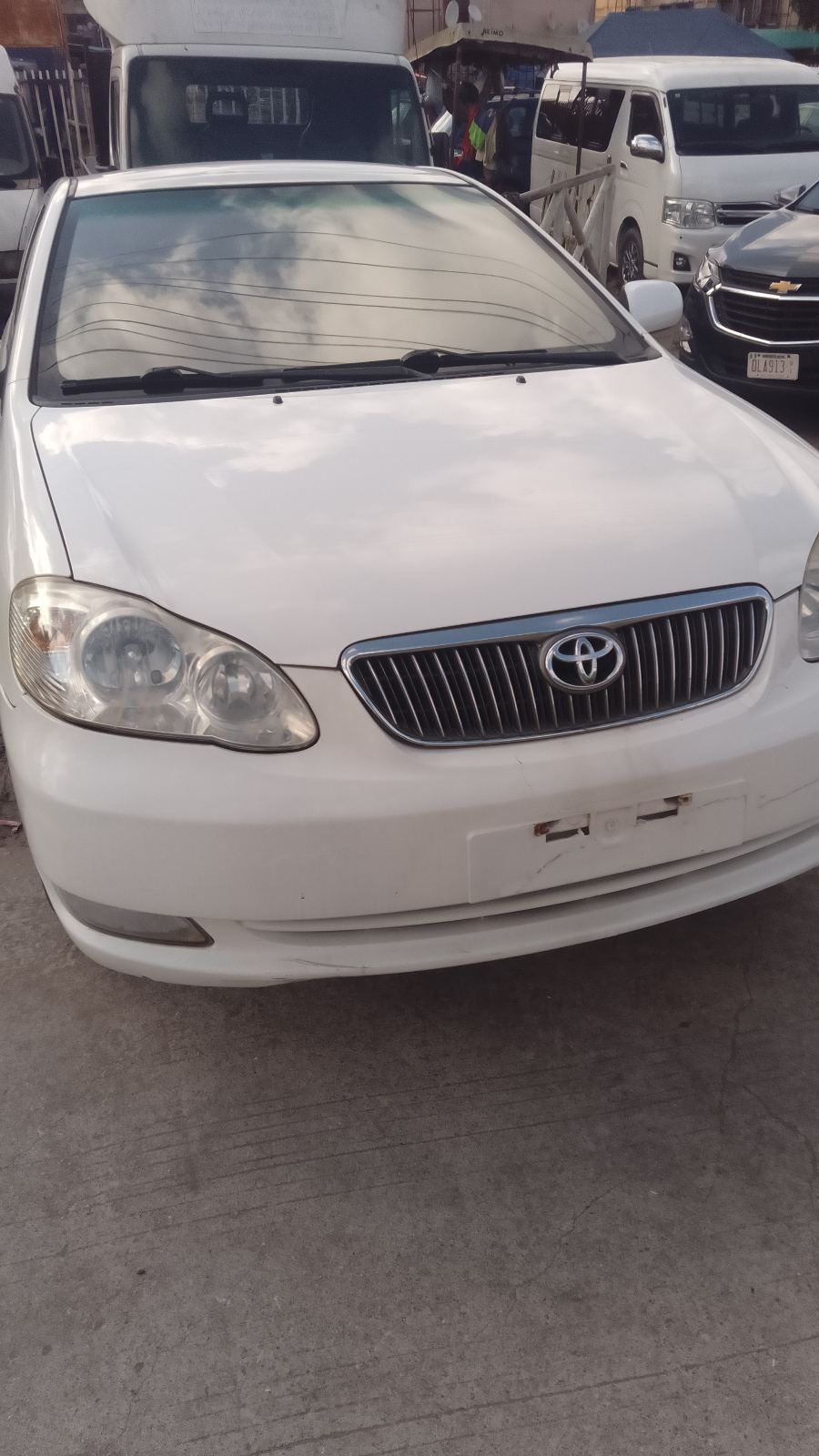 Toyota Corolla White Sedan