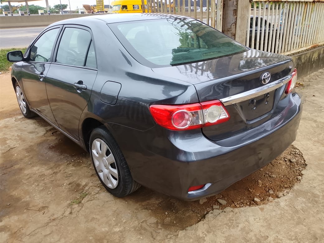 Toyota Corolla, Grey Sedan with Alloy Wheels