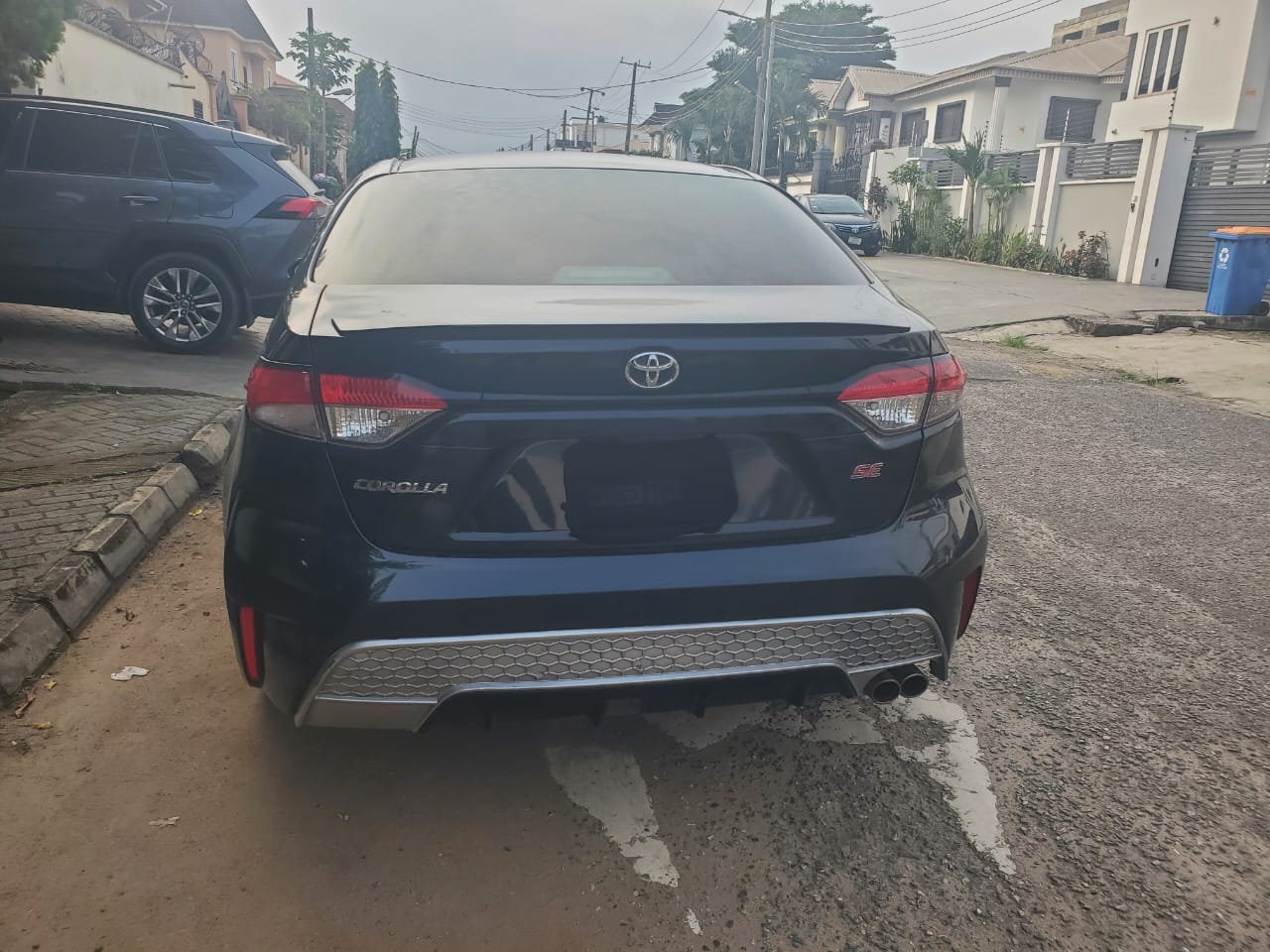 Toyota Corolla Sedan, Black with Sporty Grille