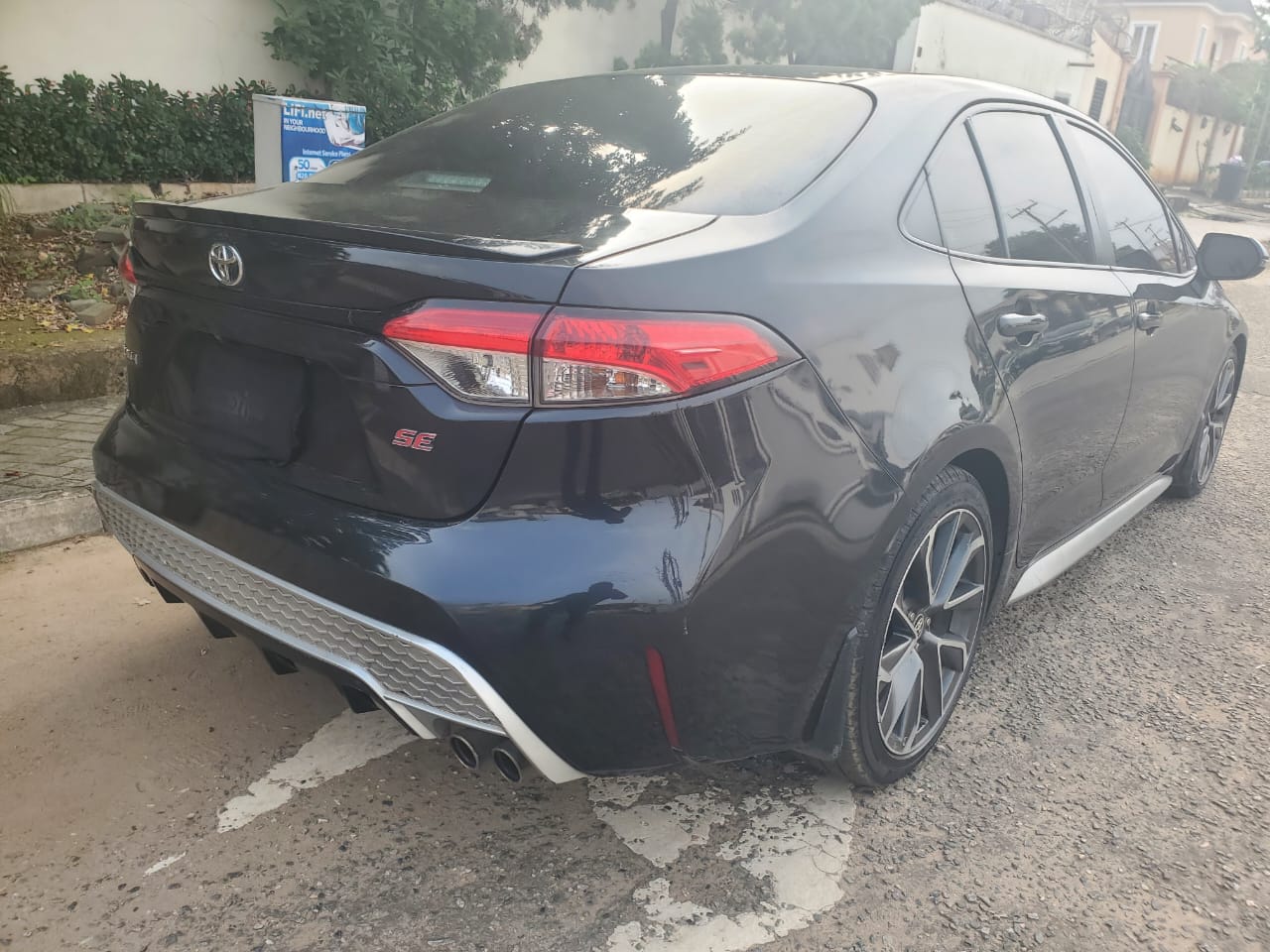 Toyota Corolla Sedan, Black with Sporty Grille