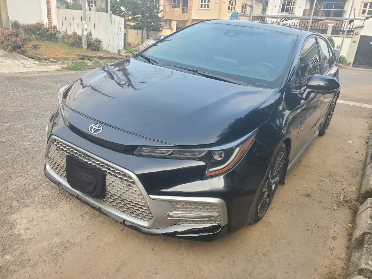 Toyota Corolla Sedan, Black with Sporty Grille