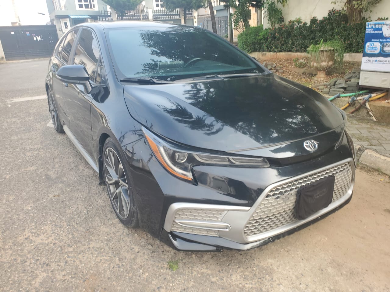 Toyota Corolla Sedan, Black with Sporty Grille