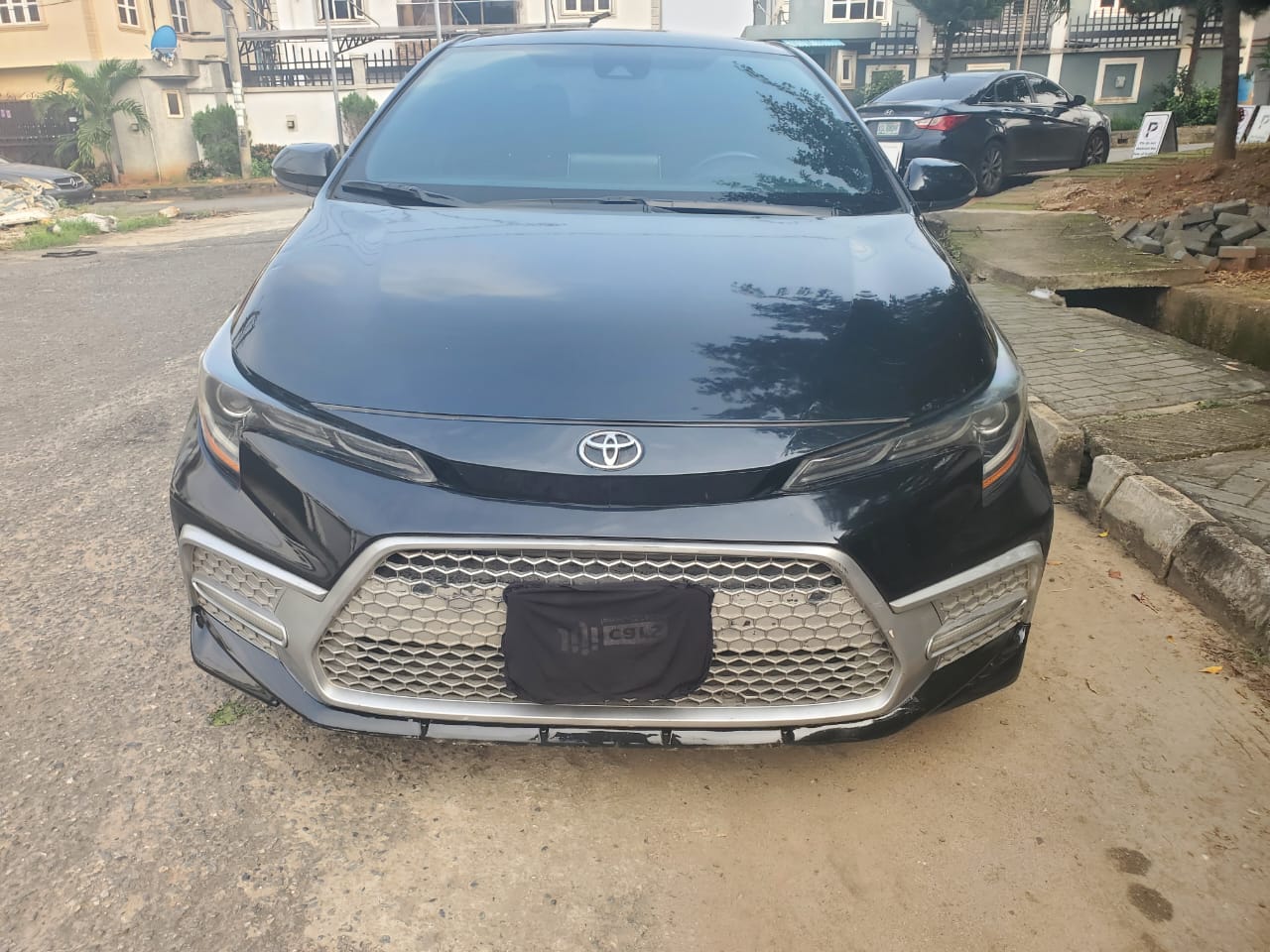 Toyota Corolla Sedan, Black with Sporty Grille