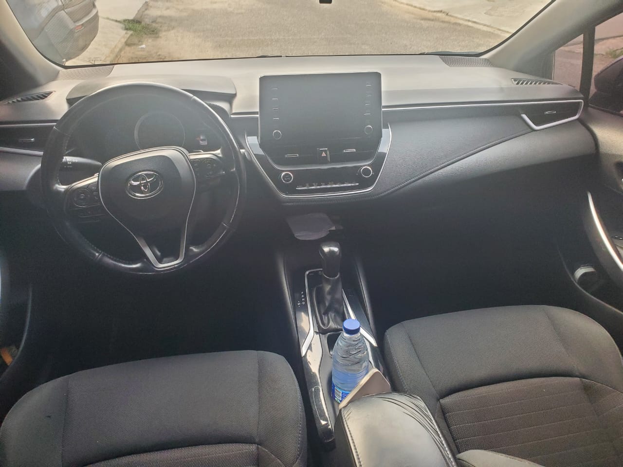 Toyota Corolla Sedan, Black with Sporty Grille
