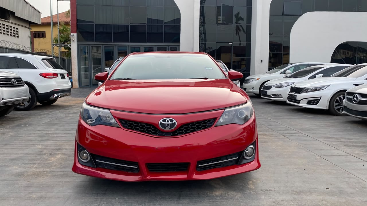 2014 Toyota Camry Red Sedan with Sporty Body Kit