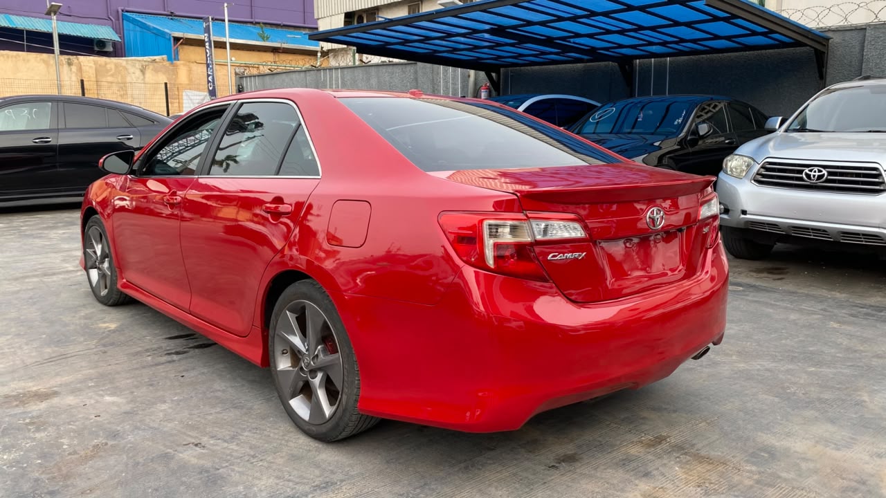 2014 Toyota Camry Red Sedan with Sporty Body Kit — photo 9