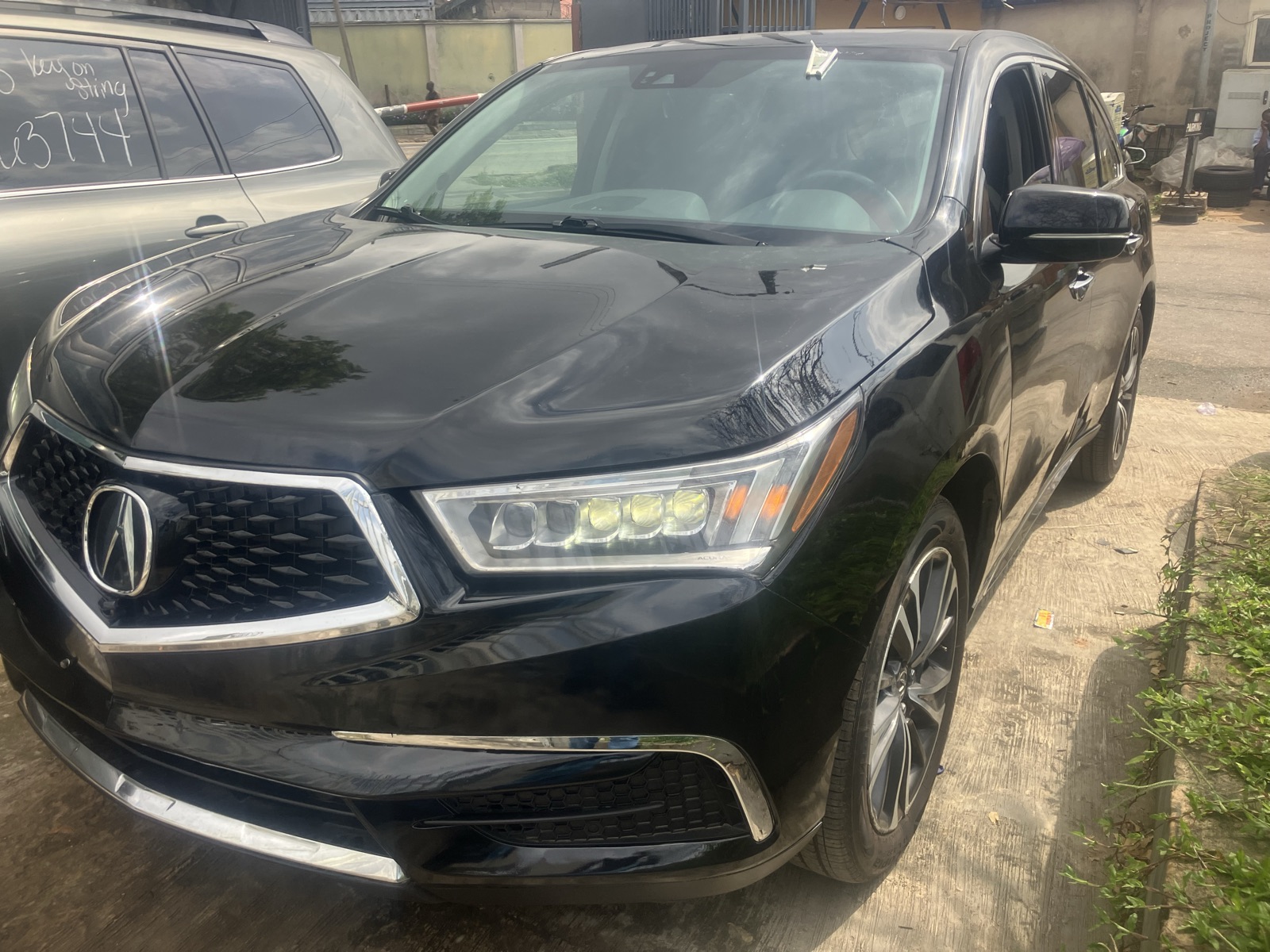 Acura MDX Black SUV with Alloy Wheels