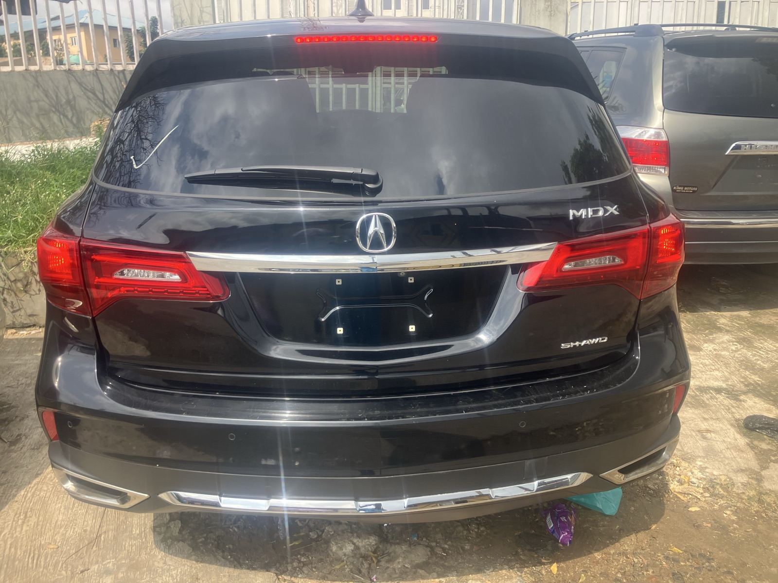 Acura MDX Black SUV with Alloy Wheels