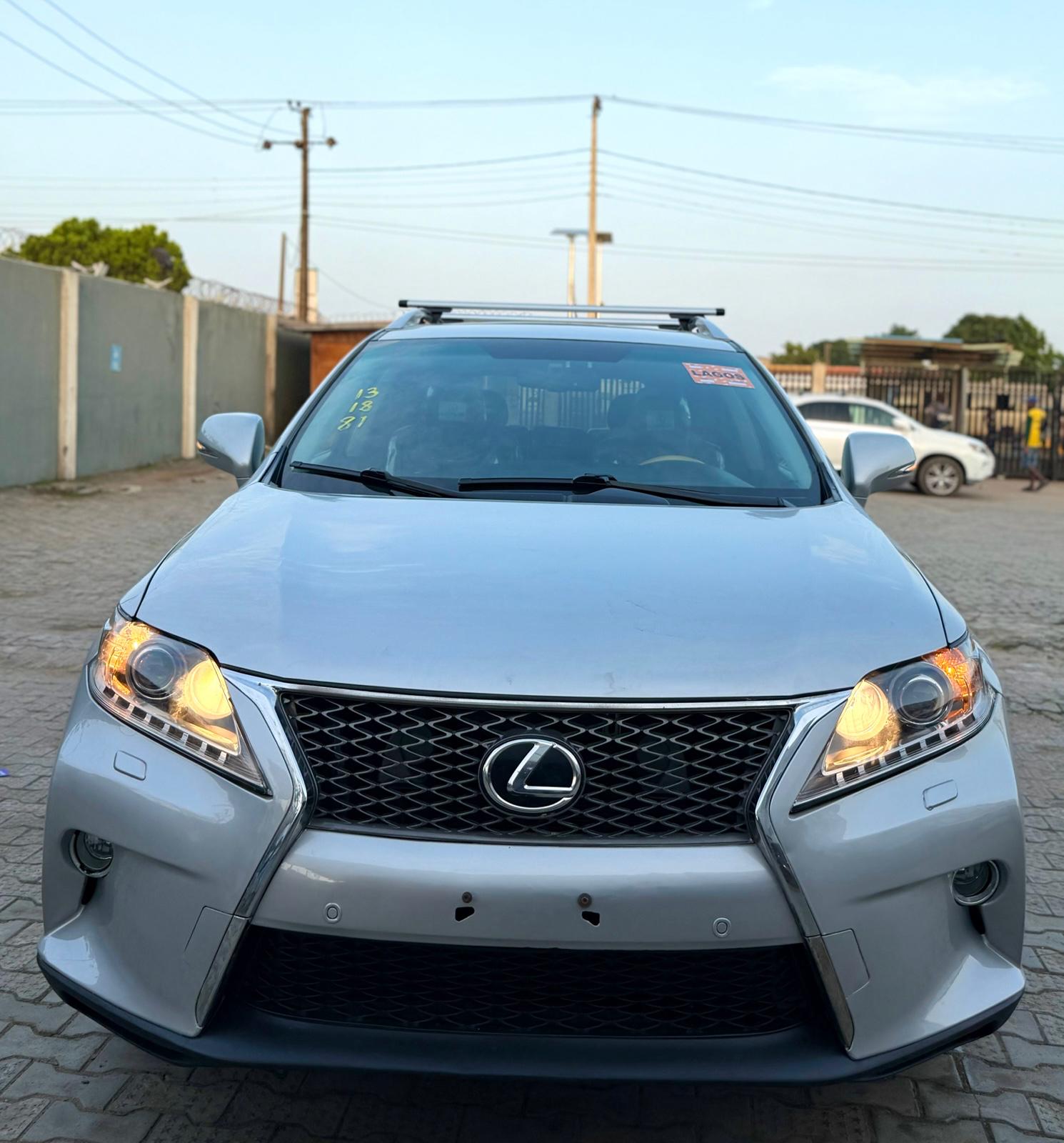 Lexus RX 350 Silver SUV with Roof Rack