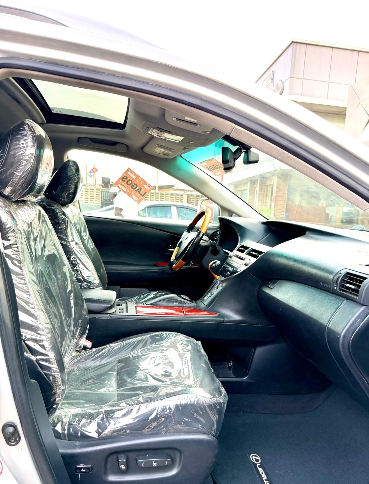 Lexus RX 350 Silver SUV with Roof Rack
