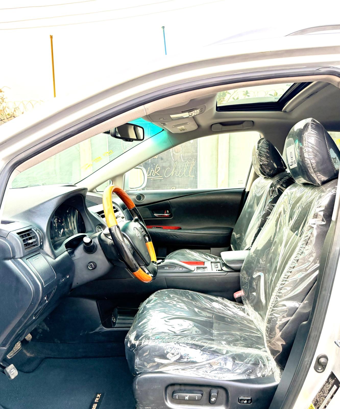 Lexus RX 350 Silver SUV with Roof Rack