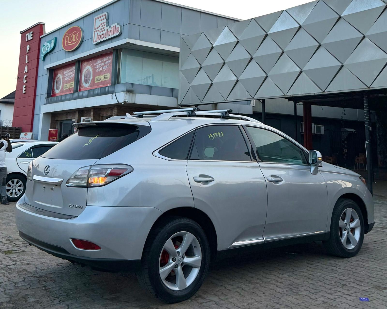 Lexus RX 350 Silver SUV with Roof Rack