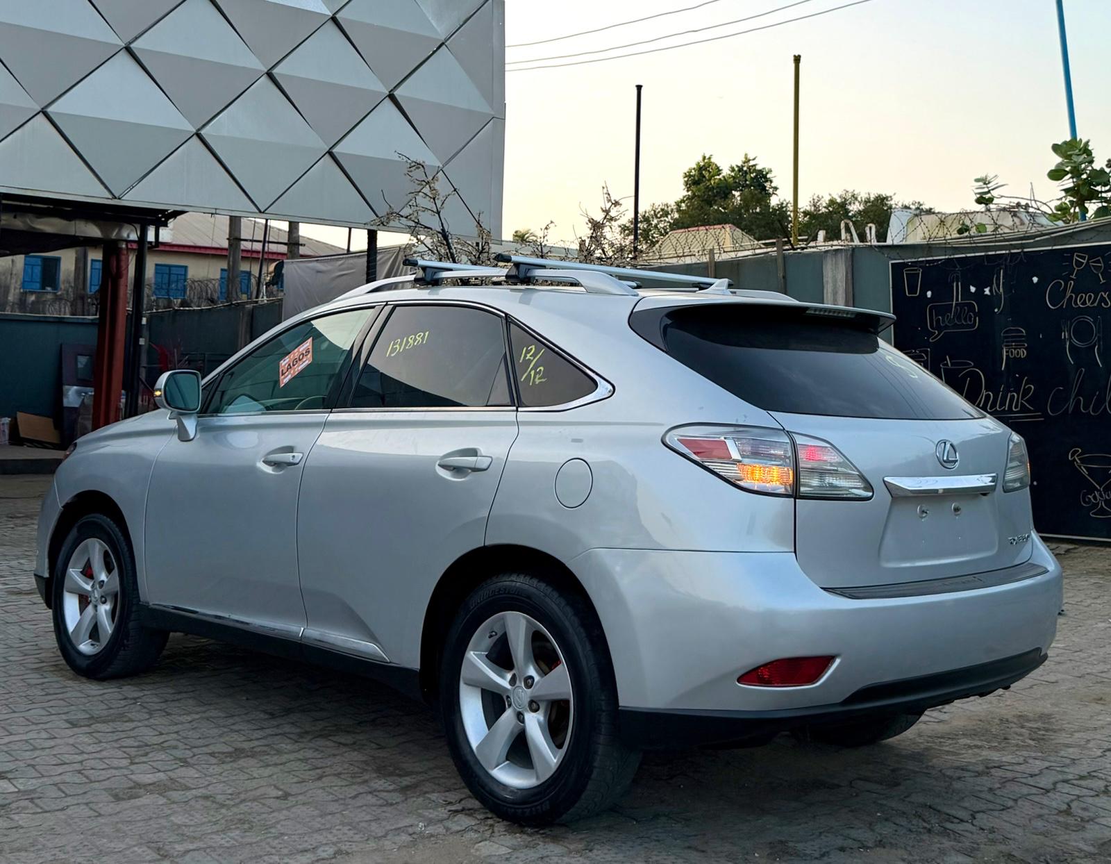 Lexus RX 350 Silver SUV with Roof Rack