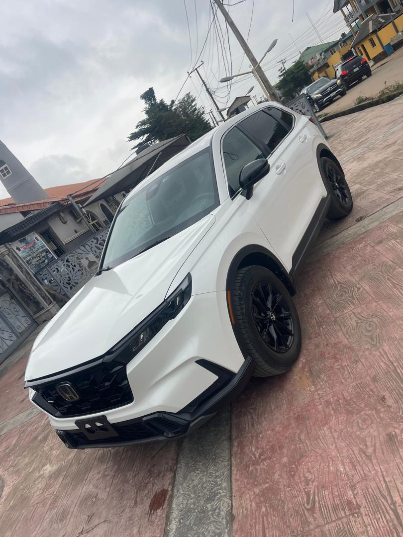 Honda CR-V White SUV with Black Rims
