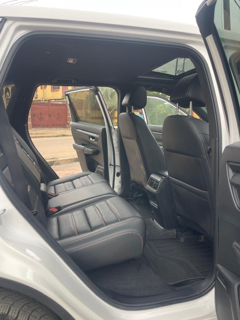 Honda CR-V White SUV with Black Rims
