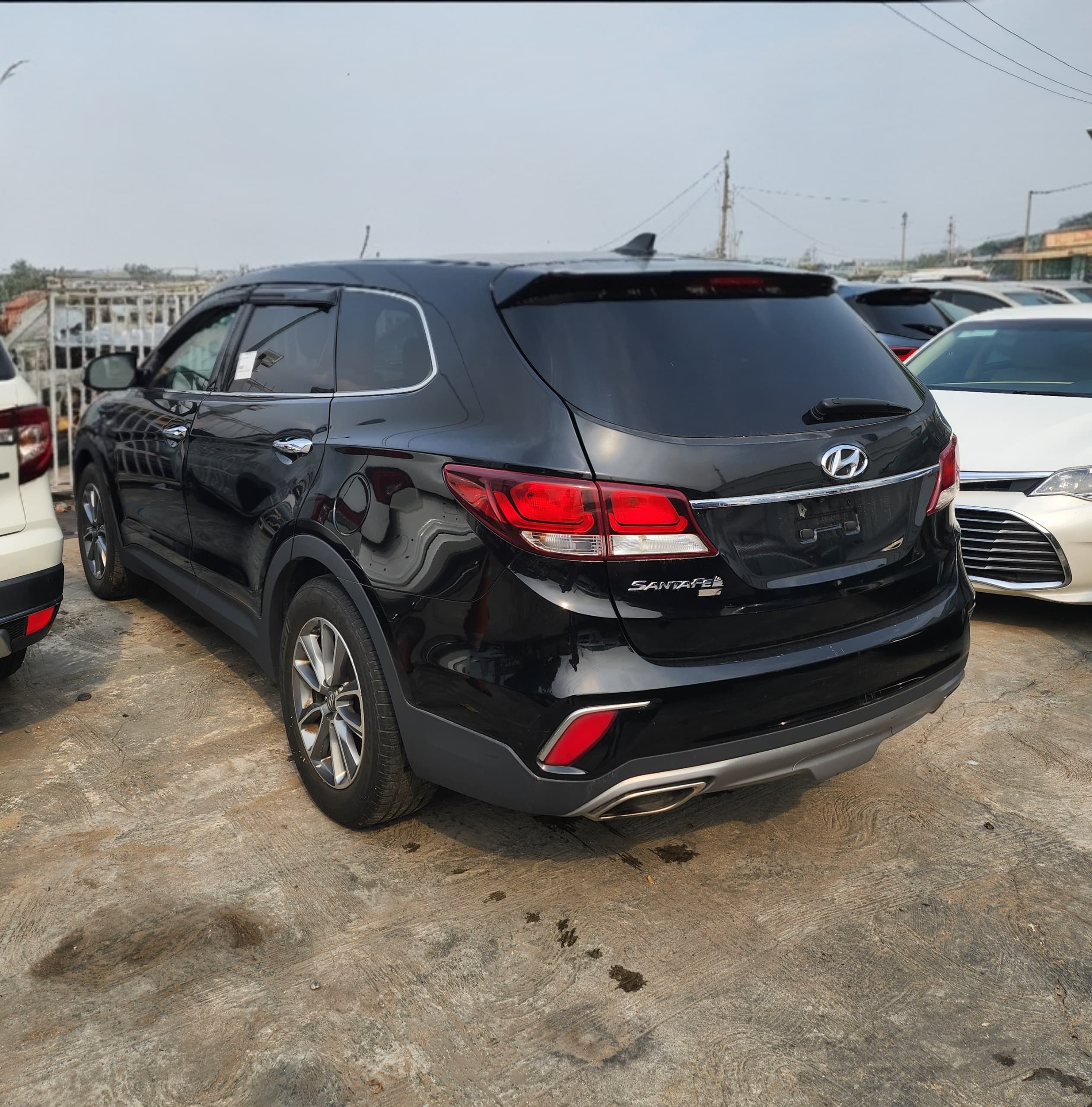 Hyundai Santa Fe SUV, Black with Roof Rails — photo 6