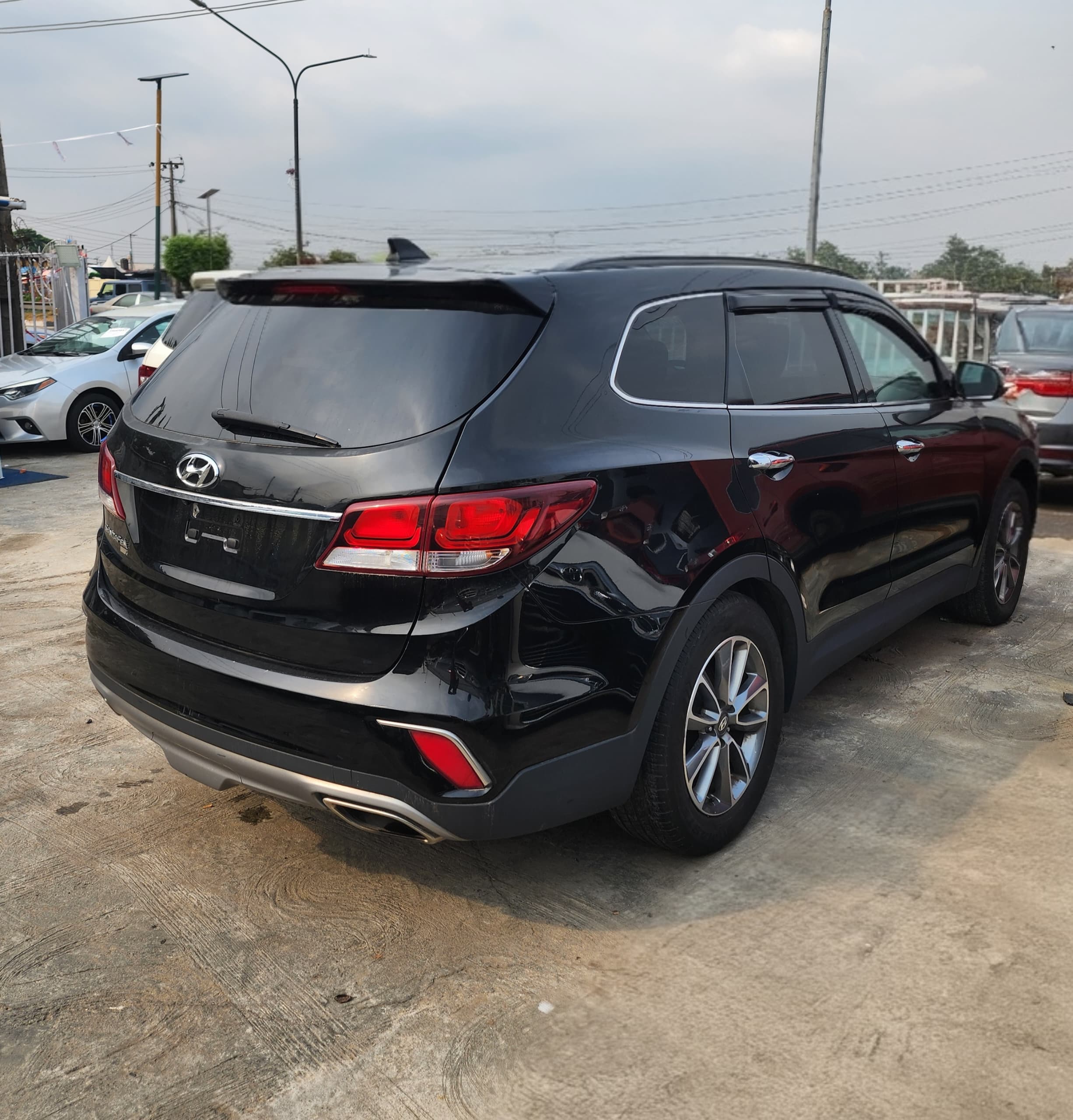 Hyundai Santa Fe SUV, Black with Roof Rails — photo 10
