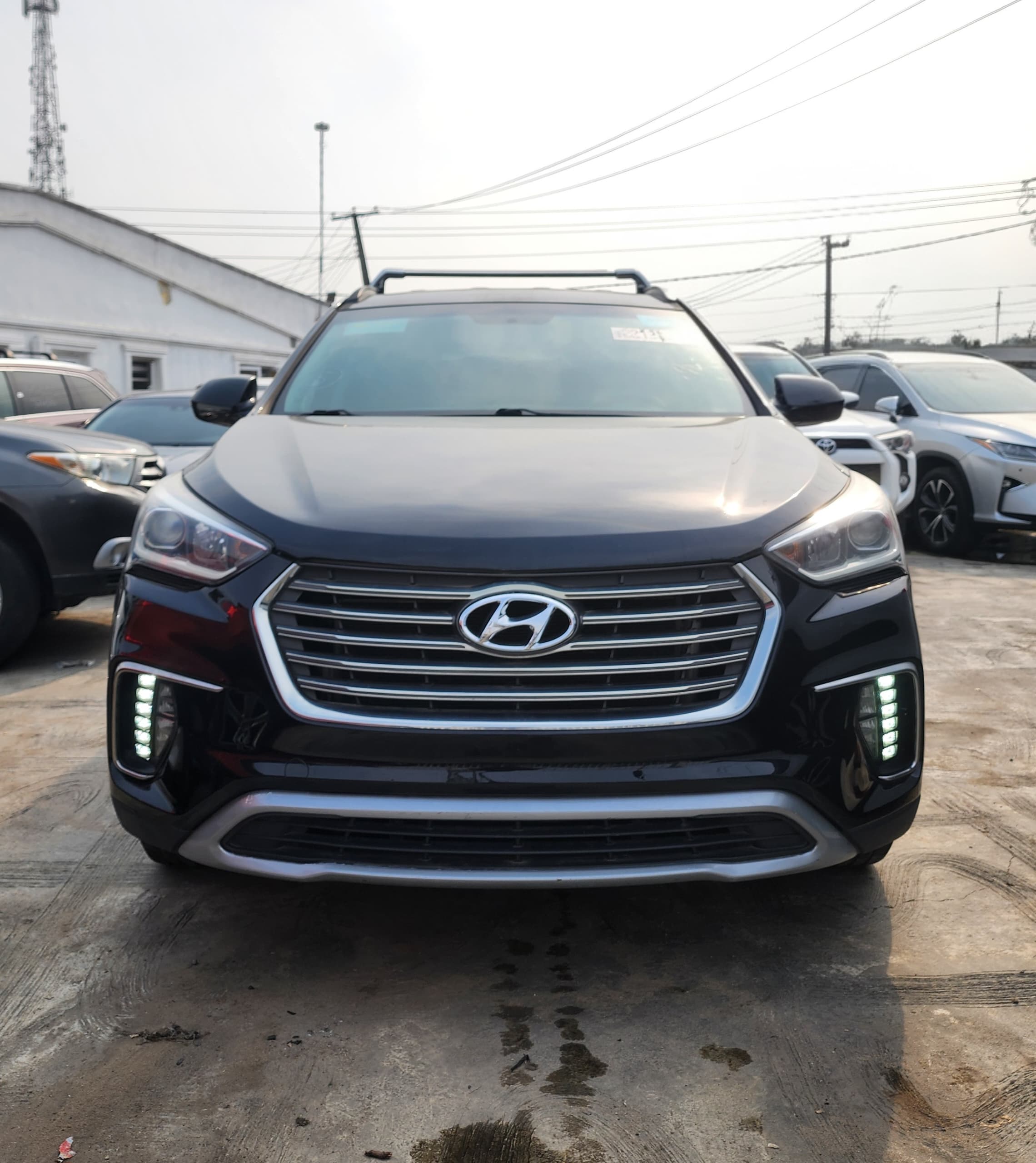 Hyundai Santa Fe SUV, Black with Roof Rails