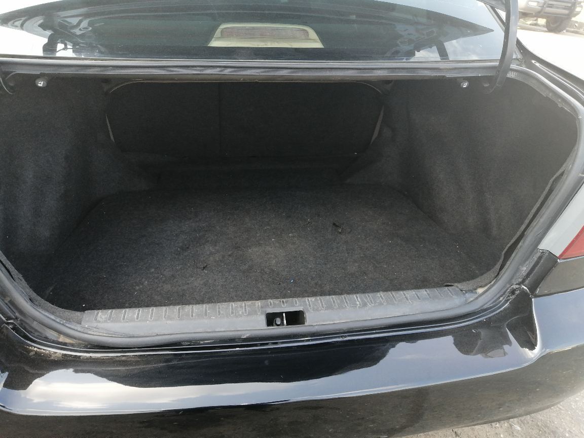 Toyota 20Toyota Corolla Black Sedan with Alloy Wheels