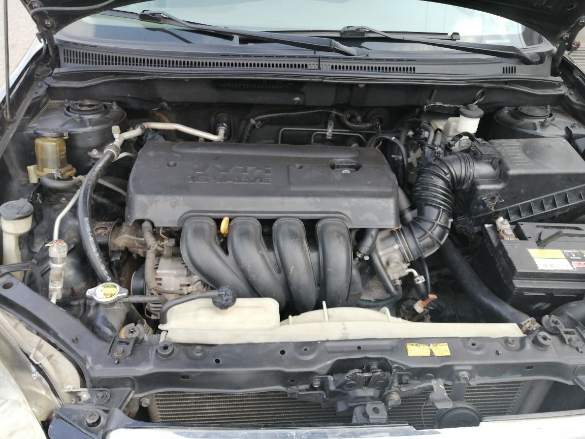 Toyota 20Toyota Corolla Black Sedan with Alloy Wheels