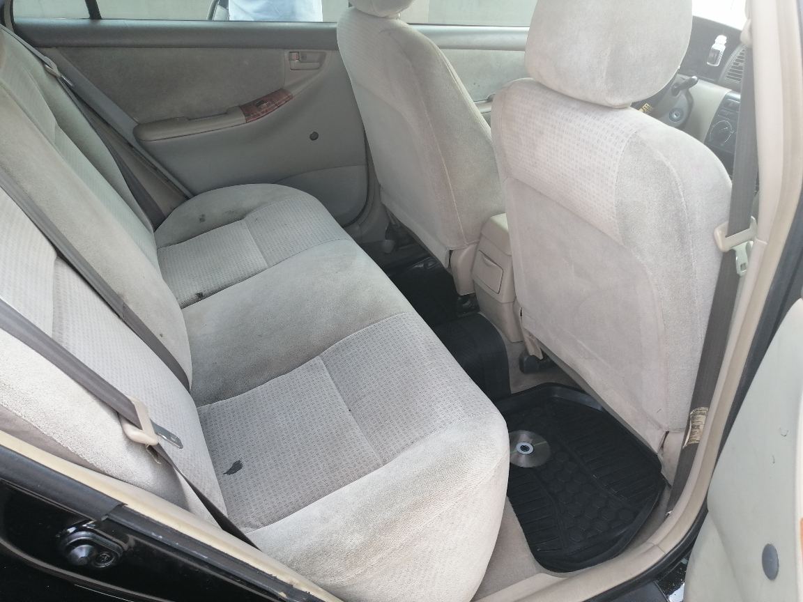 Toyota 20Toyota Corolla Black Sedan with Alloy Wheels
