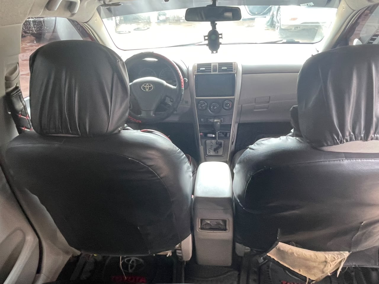 Toyota Corolla Red Sedan with Sunroof