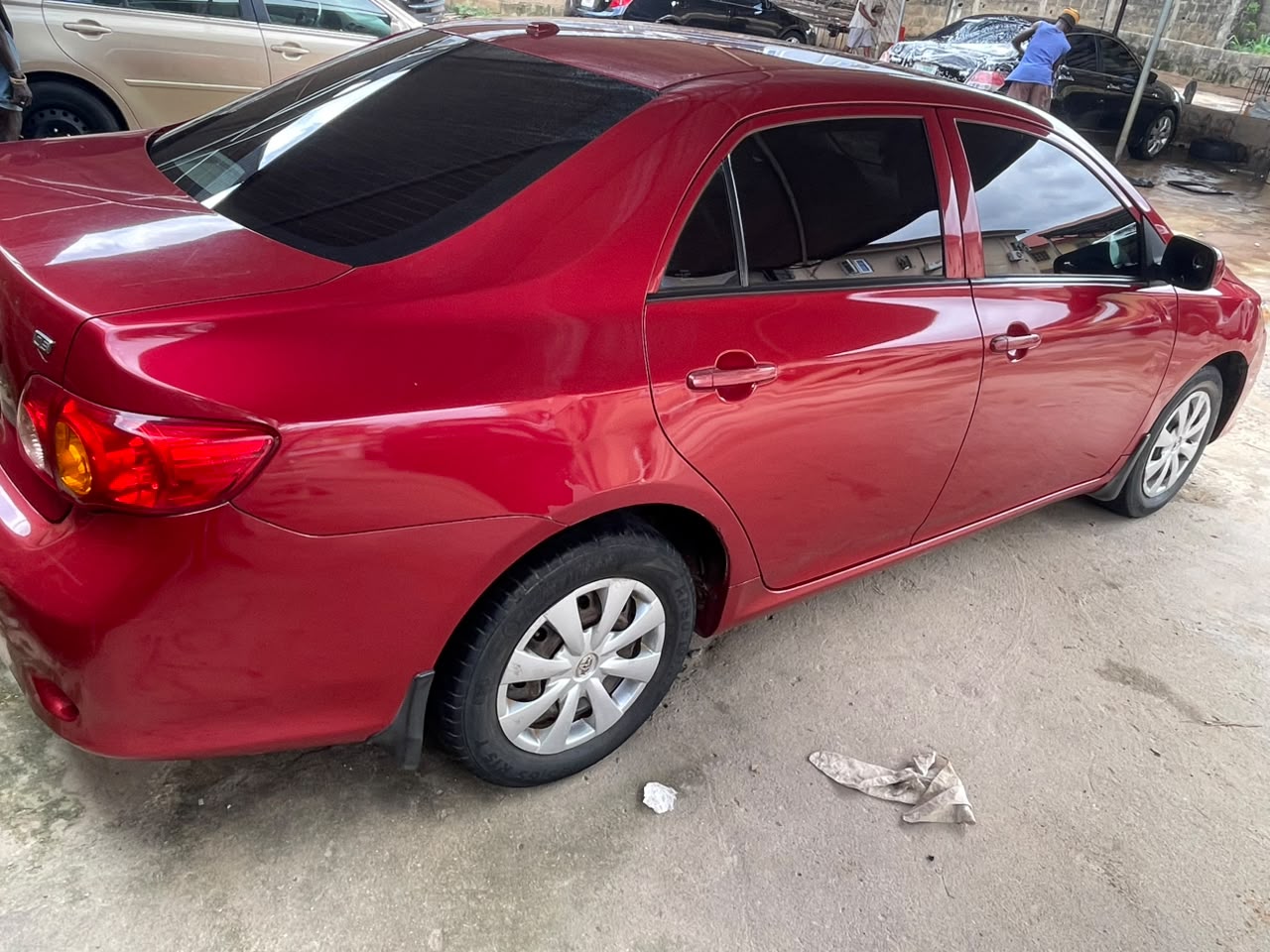Toyota Corolla Red Sedan with Sunroof