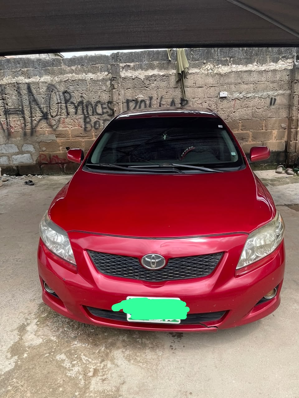 Toyota Corolla Red Sedan with Sunroof