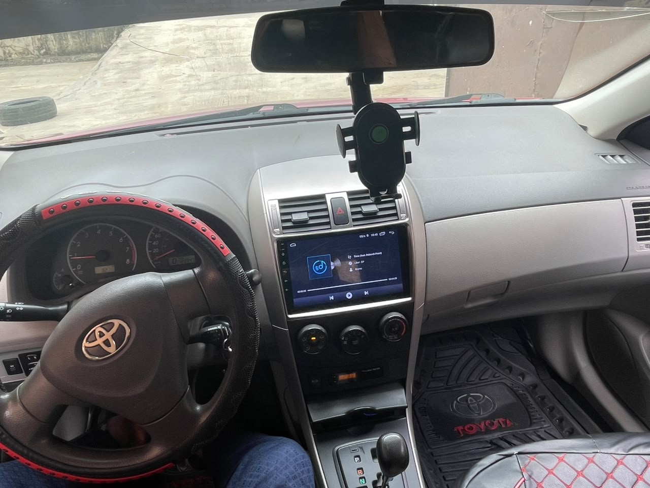 Toyota Corolla Red Sedan with Sunroof