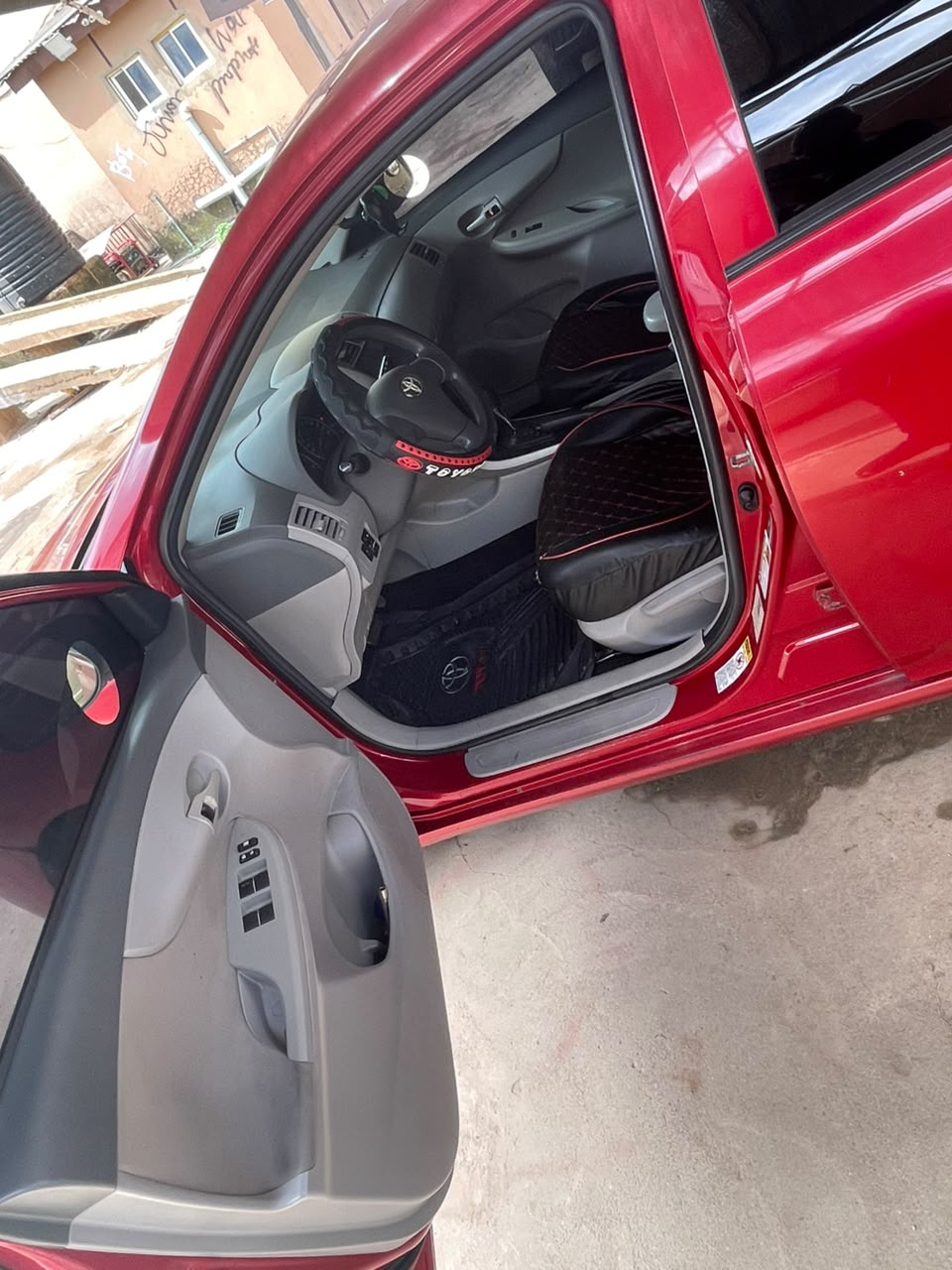 Toyota Corolla Red Sedan with Sunroof