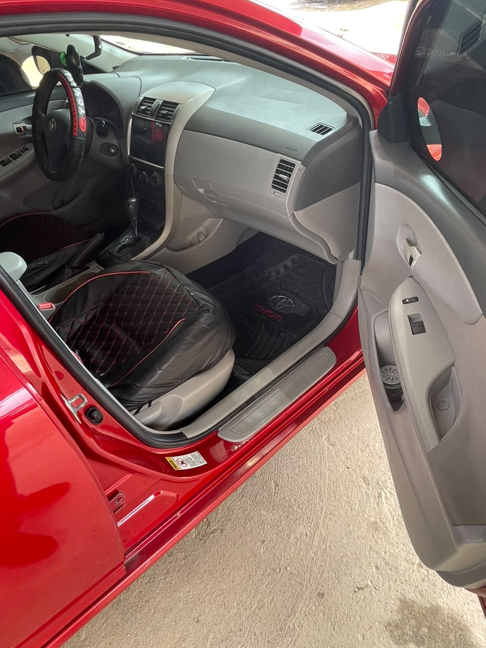 Toyota Corolla Red Sedan with Sunroof