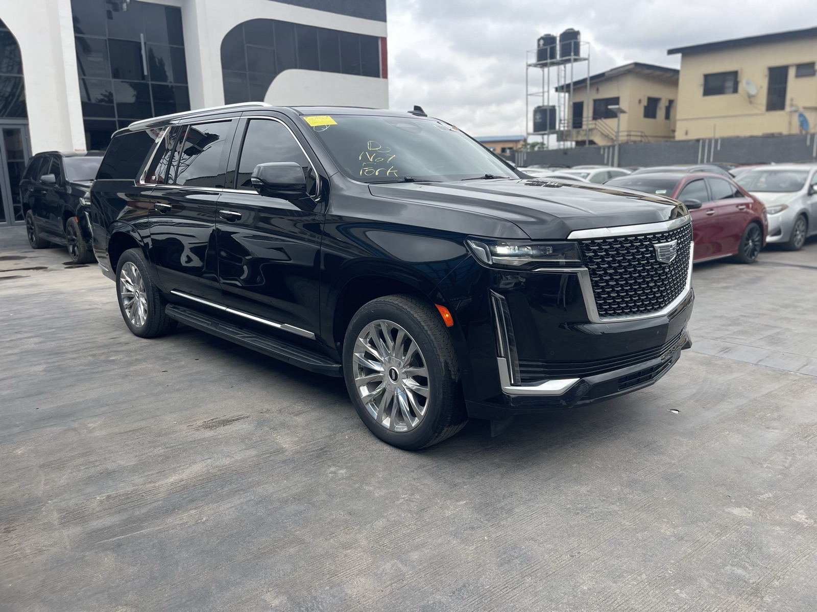 Toks 2021 Cadillac Escalade Black SUV with Chrome Wheels