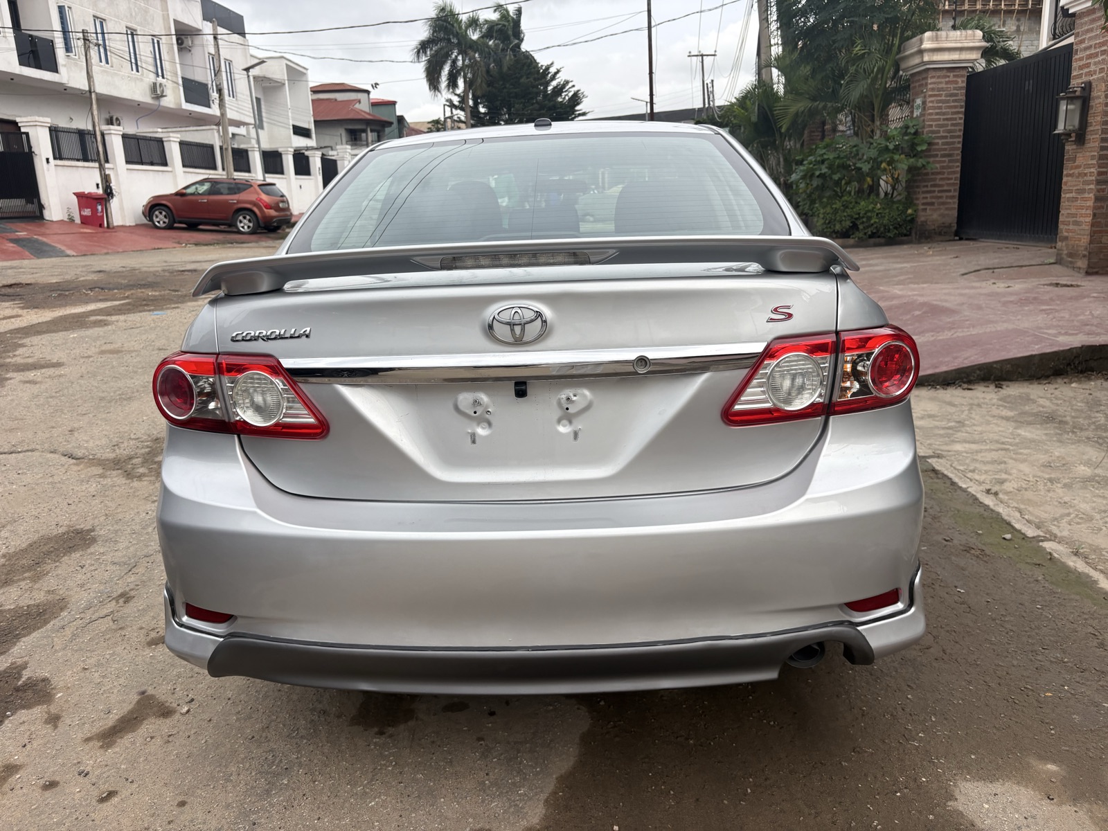 2012 Toyota Corolla Silver Sedan with Spoiler — photo 3