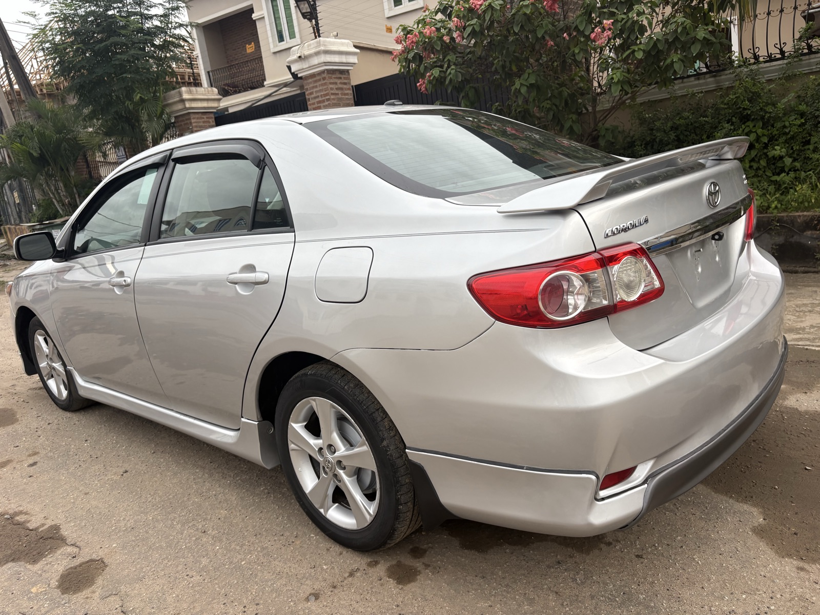 2012 Toyota Corolla Silver Sedan with Spoiler — photo 5