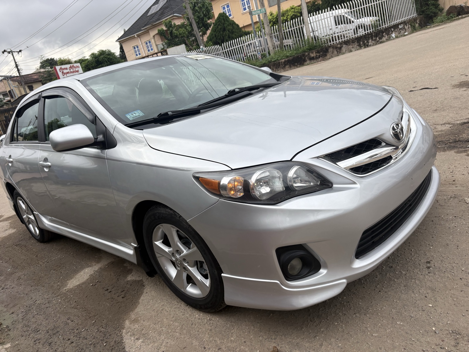 2012 Toyota Corolla Silver Sedan with Spoiler — photo 7