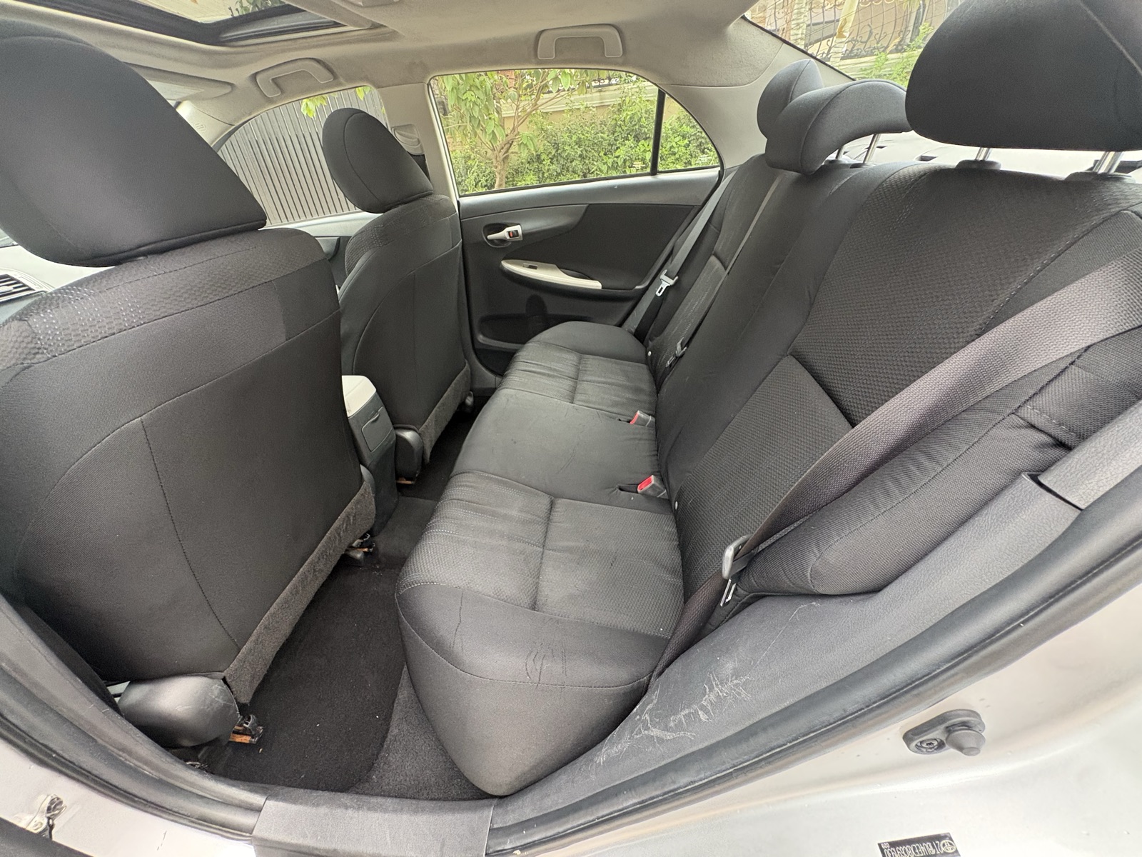 2012 Toyota Corolla Silver Sedan with Spoiler — photo 9