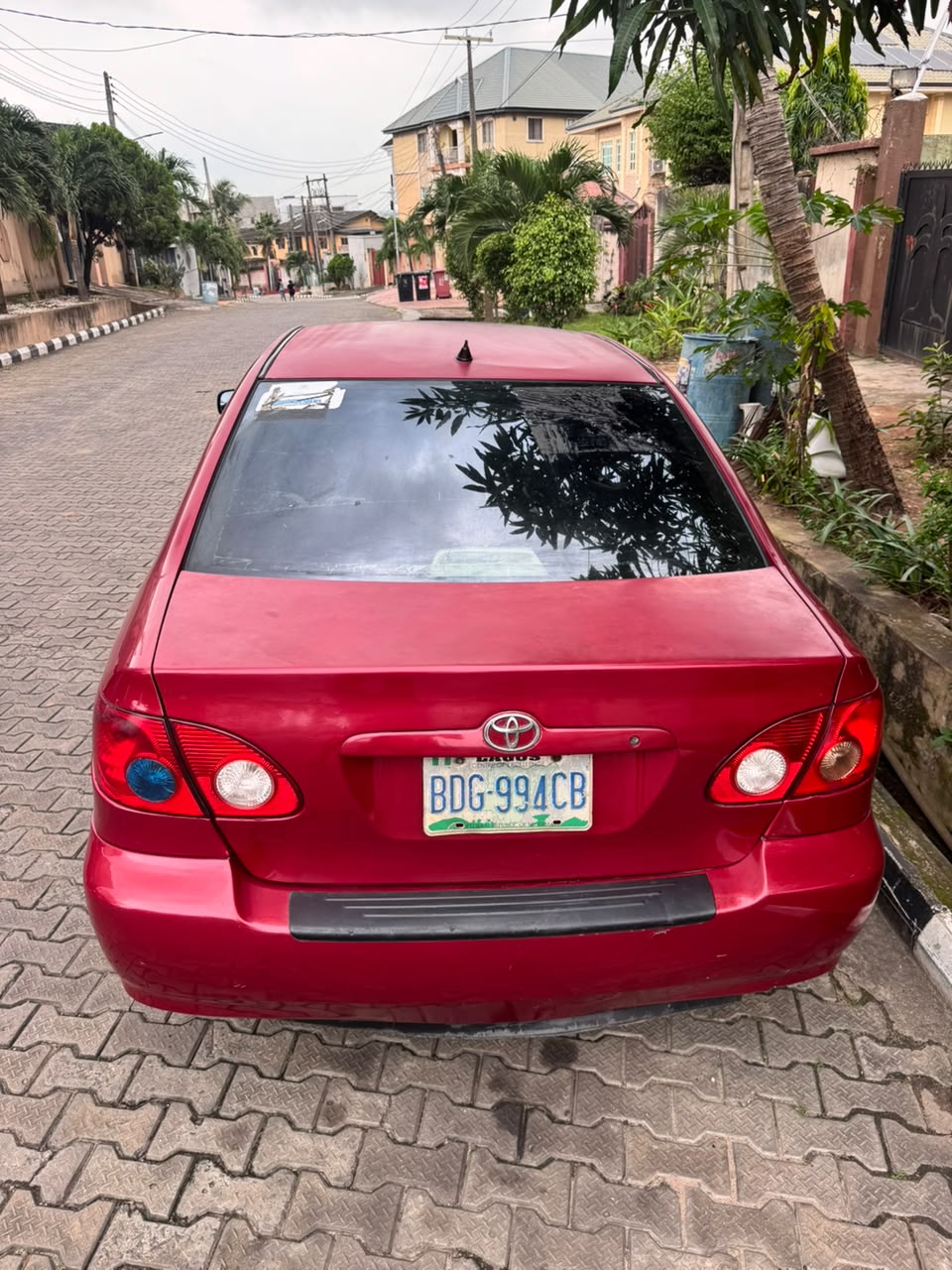 2006 Toyota Corolla Red Sedan — photo 3