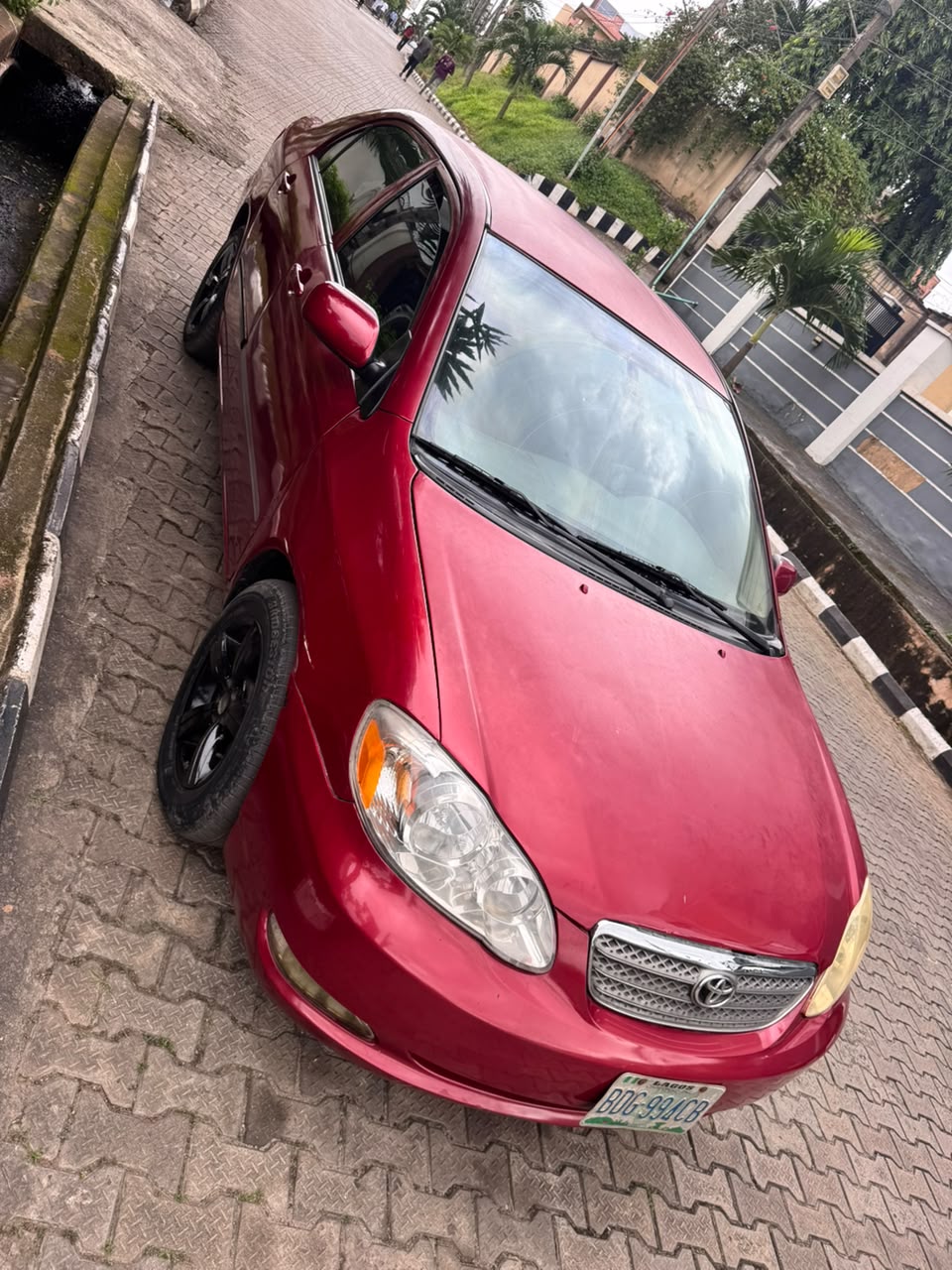 2006 Toyota Corolla Red Sedan — photo 4