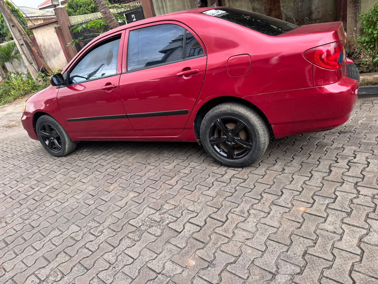 2006 Toyota Corolla Red Sedan — photo 5